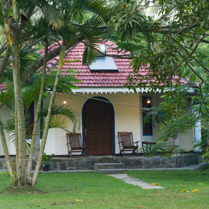 Exterior view of the family bungalow from the garden, with private and peaceful outdoor space